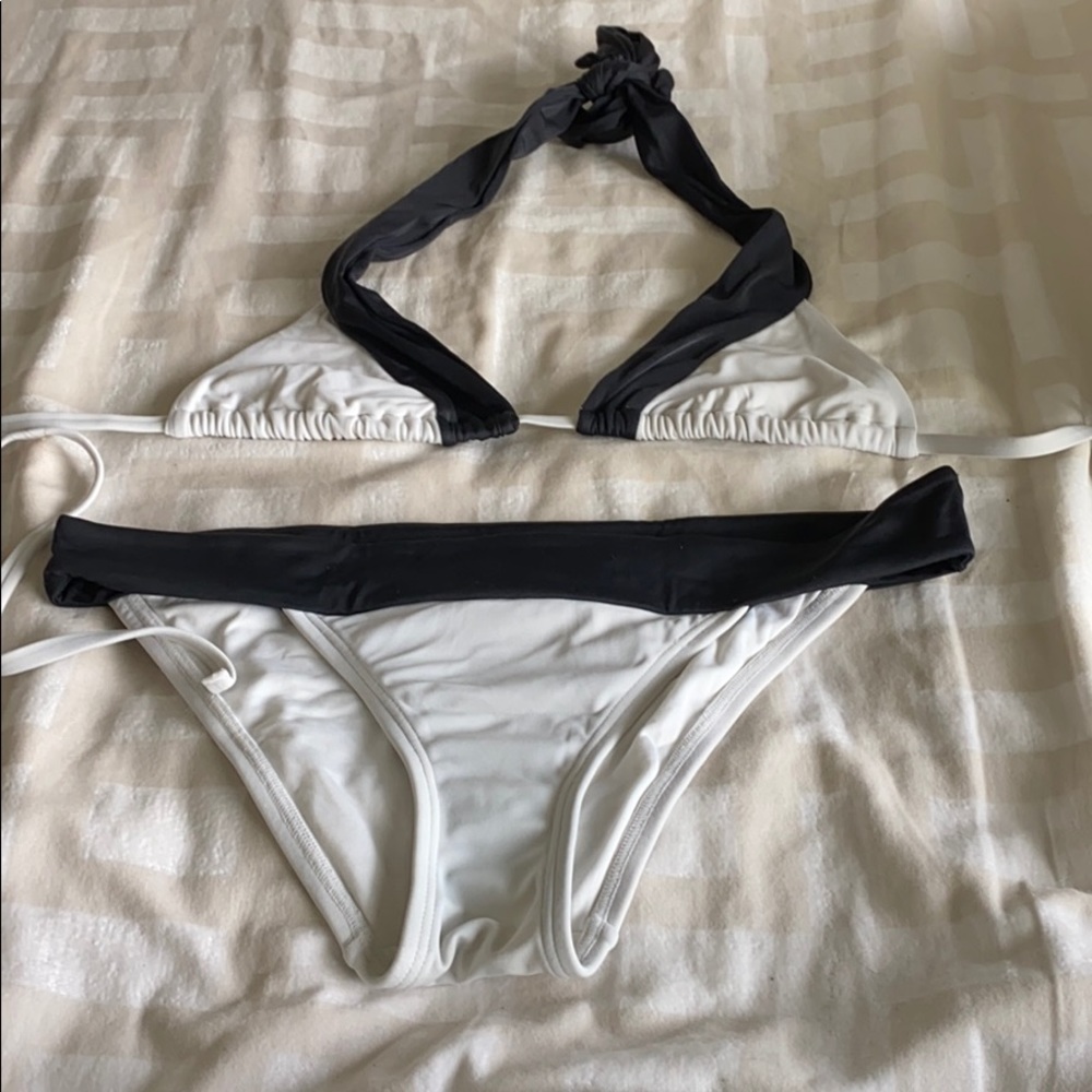 Victoria’s Secret black & white swim suite.